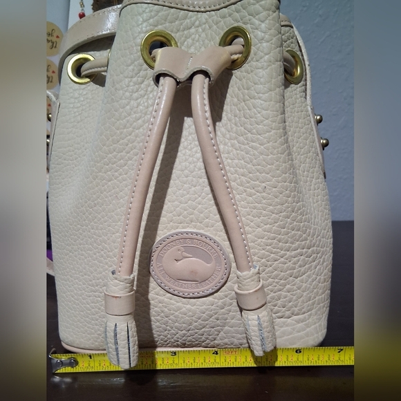 Dooney & Bourke Cream Pebbled Leather Bucket Bag - Picture 2 of 10